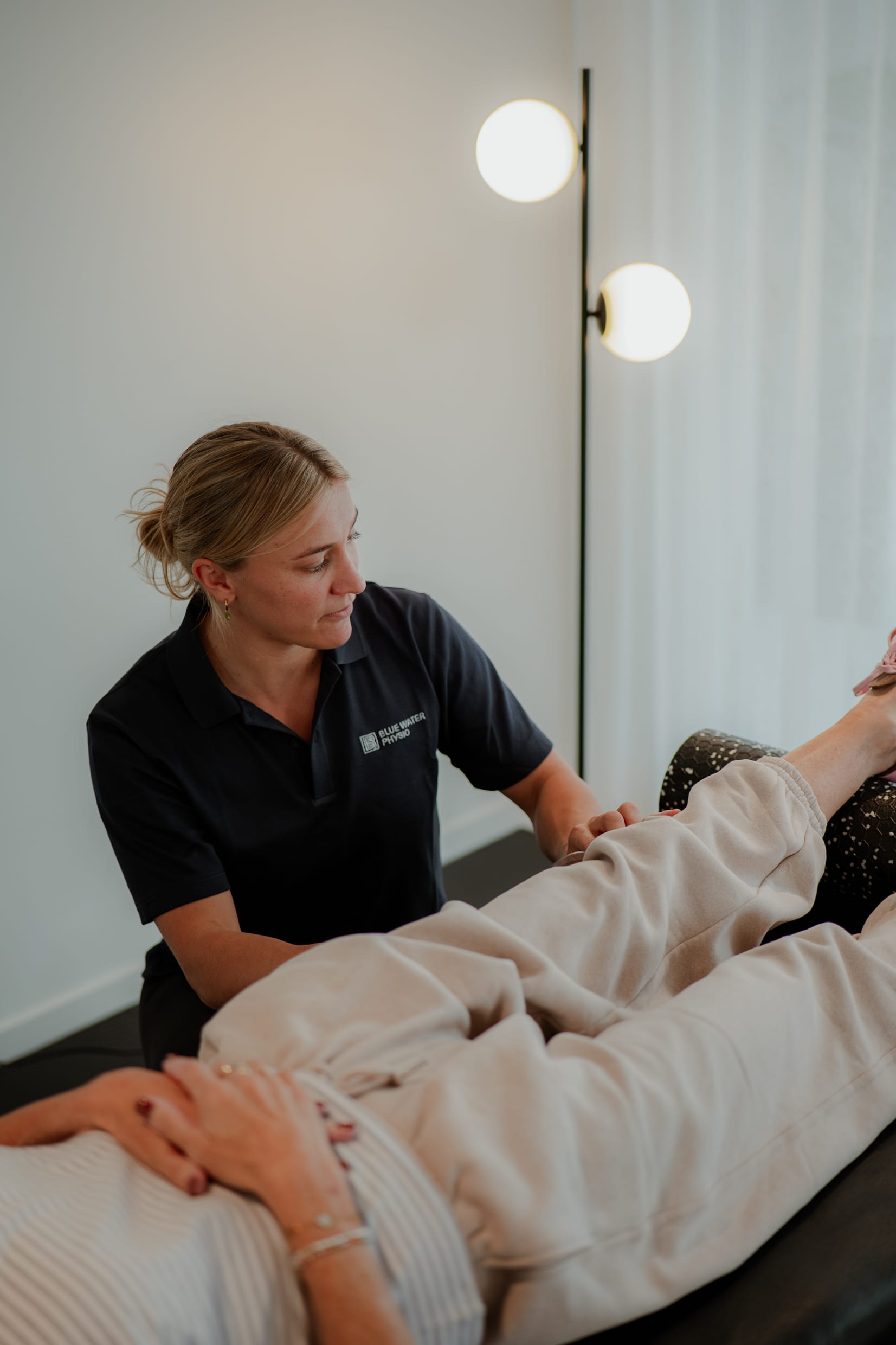 Physio treating patient's leg