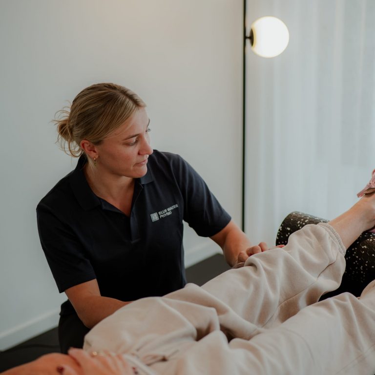 Physio treating patient's leg